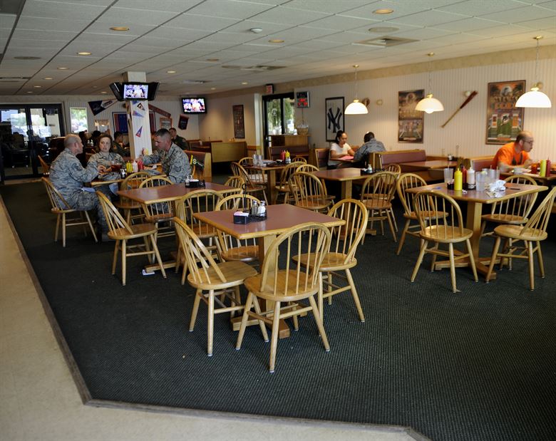 Food-managers-preparing-restaurants-for-reopening-after-Covid-19-shutdown certified food managers spacing tables for social distancing