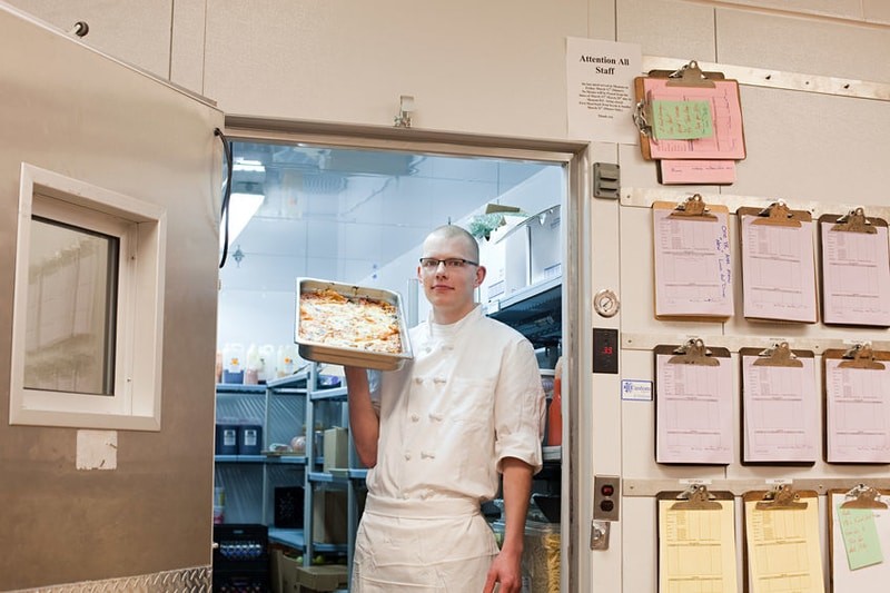 Food manager in walk-in freezer