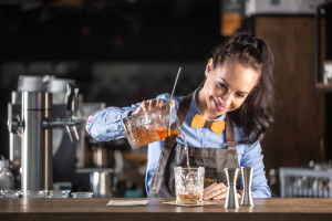 Bartender using ice